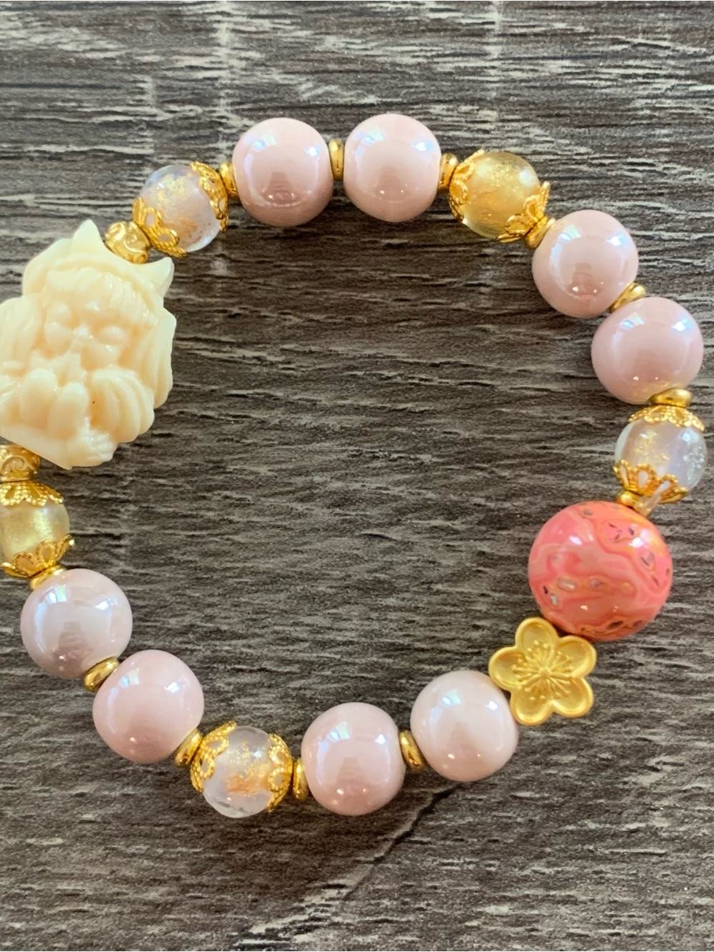 Handmade Pink & Gold Beaded Bracelet with Carved Charm